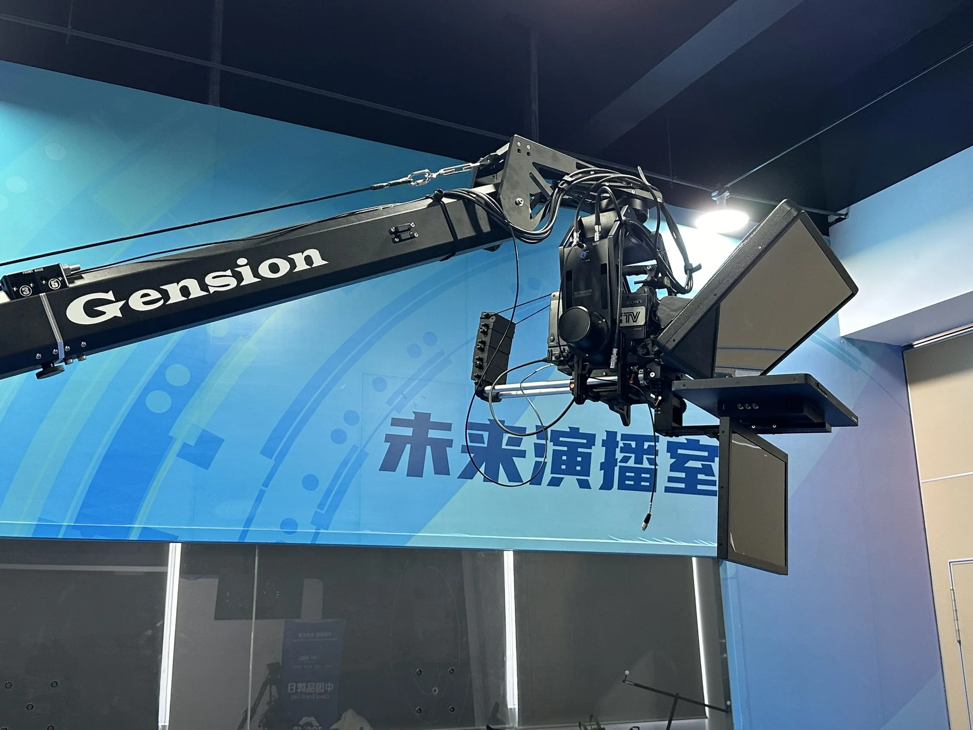 Jib Crane Teleprompter rigged on a Gension crane arm