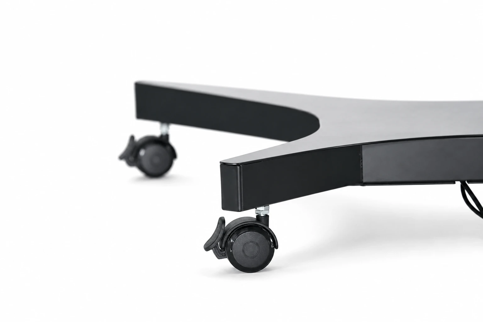 Close-up of the Stage Teleprompter lockable swivel caster and low-profile wheeled base